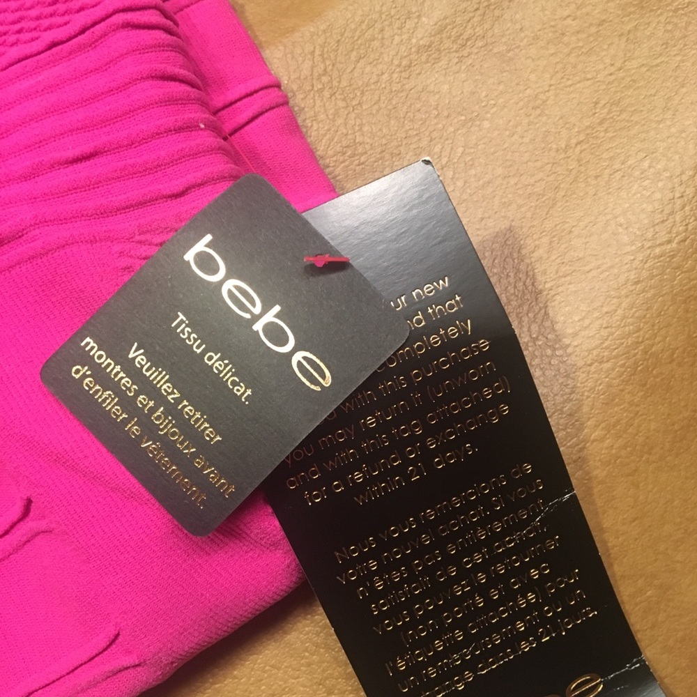 NEW WITH TAGS!!! Bebe Fuchsia dress  Size M/L